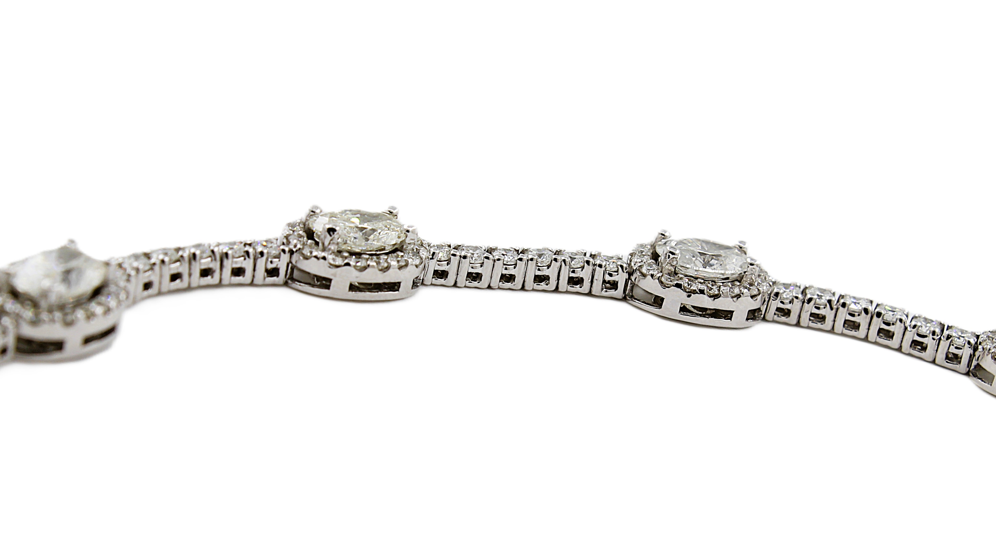 Round & Oval Cut Diamond Tennis Bracelet with Halo's