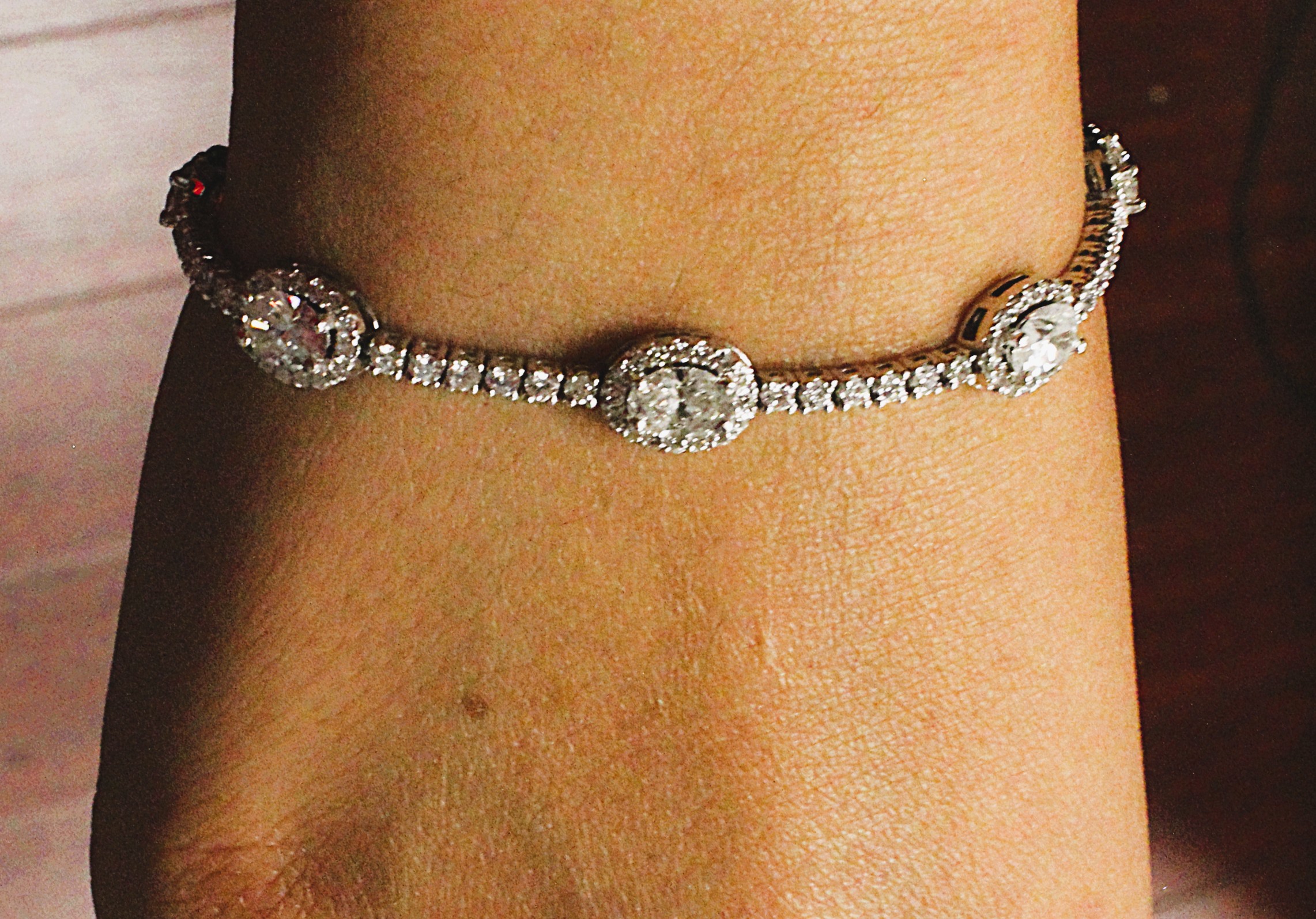 Round & Oval Cut Diamond Tennis Bracelet with Halo's